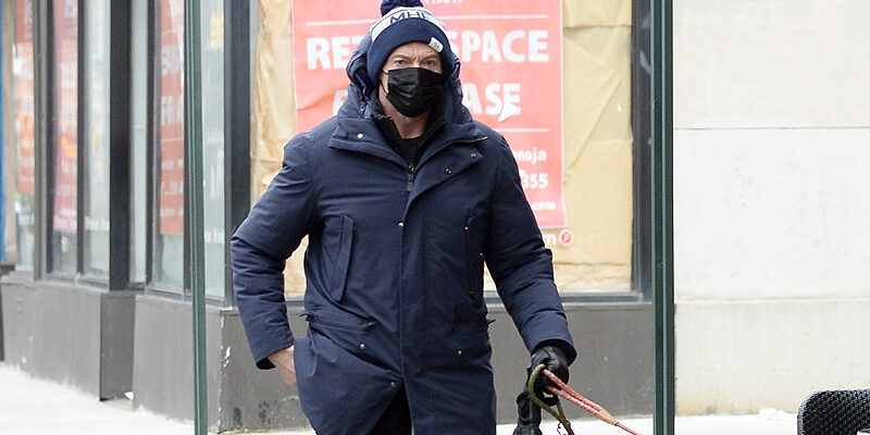 Photos: January 16 – Out for a walk with his dog in New York City